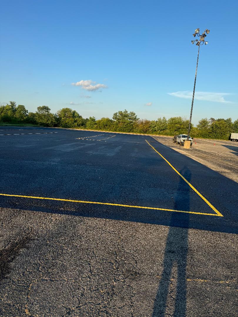 Asphalt Transformation: Seal Coating and Parking Lot Striping by Brynco Improvements Thumbnail